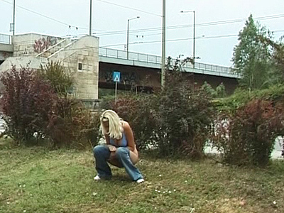 Slutty peeing in bushes